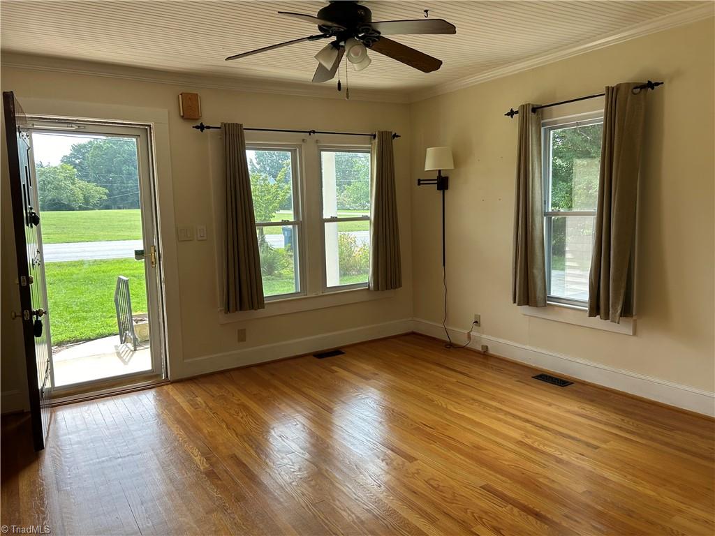 2911 Pleasant Ridge Road Summerfield, NC 27358 - Photo 14 of 47 Living room w hardwood floors