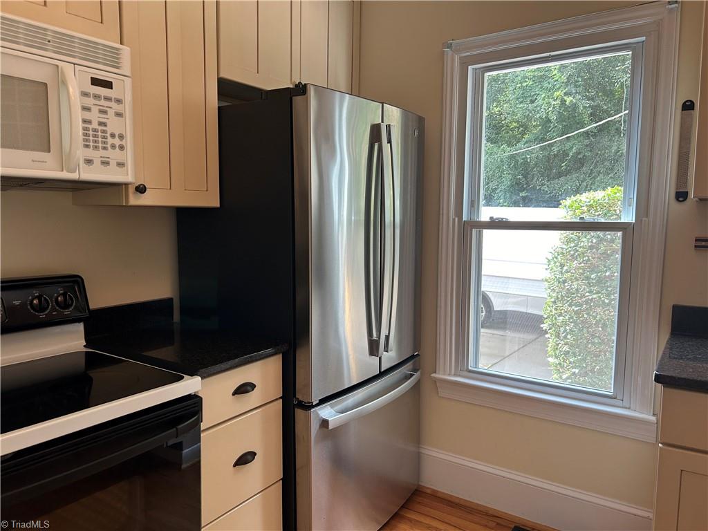 2911 Pleasant Ridge Road Summerfield, NC 27358 - Photo 18 of 47 Graniite counters and stainless appliances
