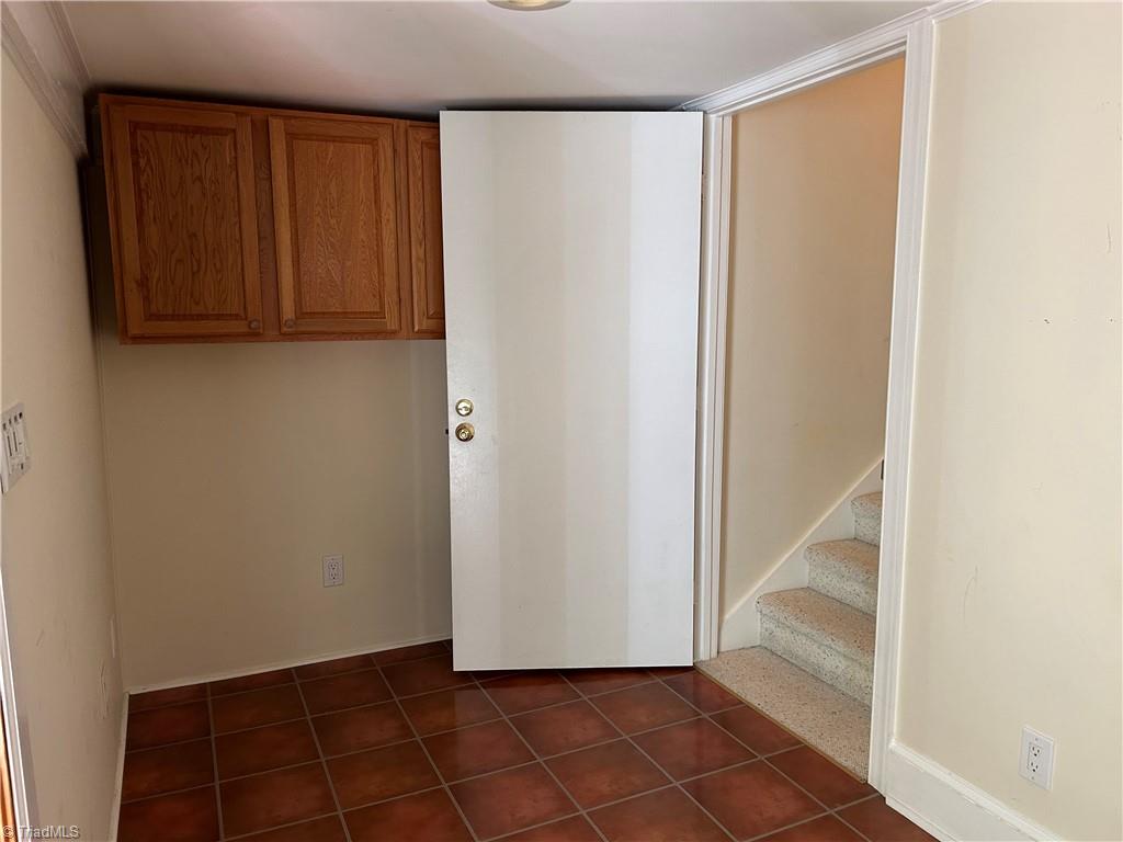 2911 Pleasant Ridge Road Summerfield, NC 27358 - Photo 29 of 47 Auxilllary room between kitchen and sun room