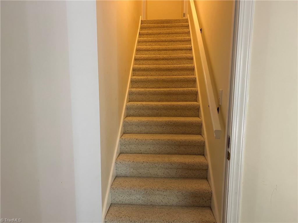 2911 Pleasant Ridge Road Summerfield, NC 27358 - Photo 30 of 47 Stairs to upper level
