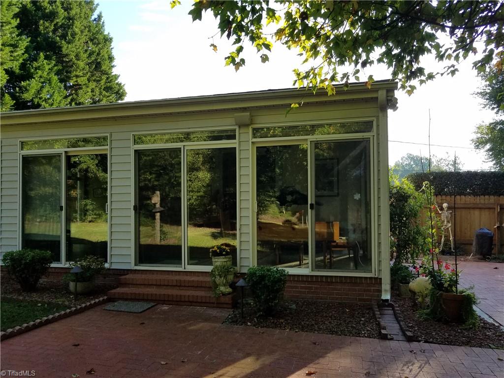 2911 Pleasant Ridge Road Summerfield, NC 27358 - Photo 9 of 47 Lots of sliding glass doors with screens