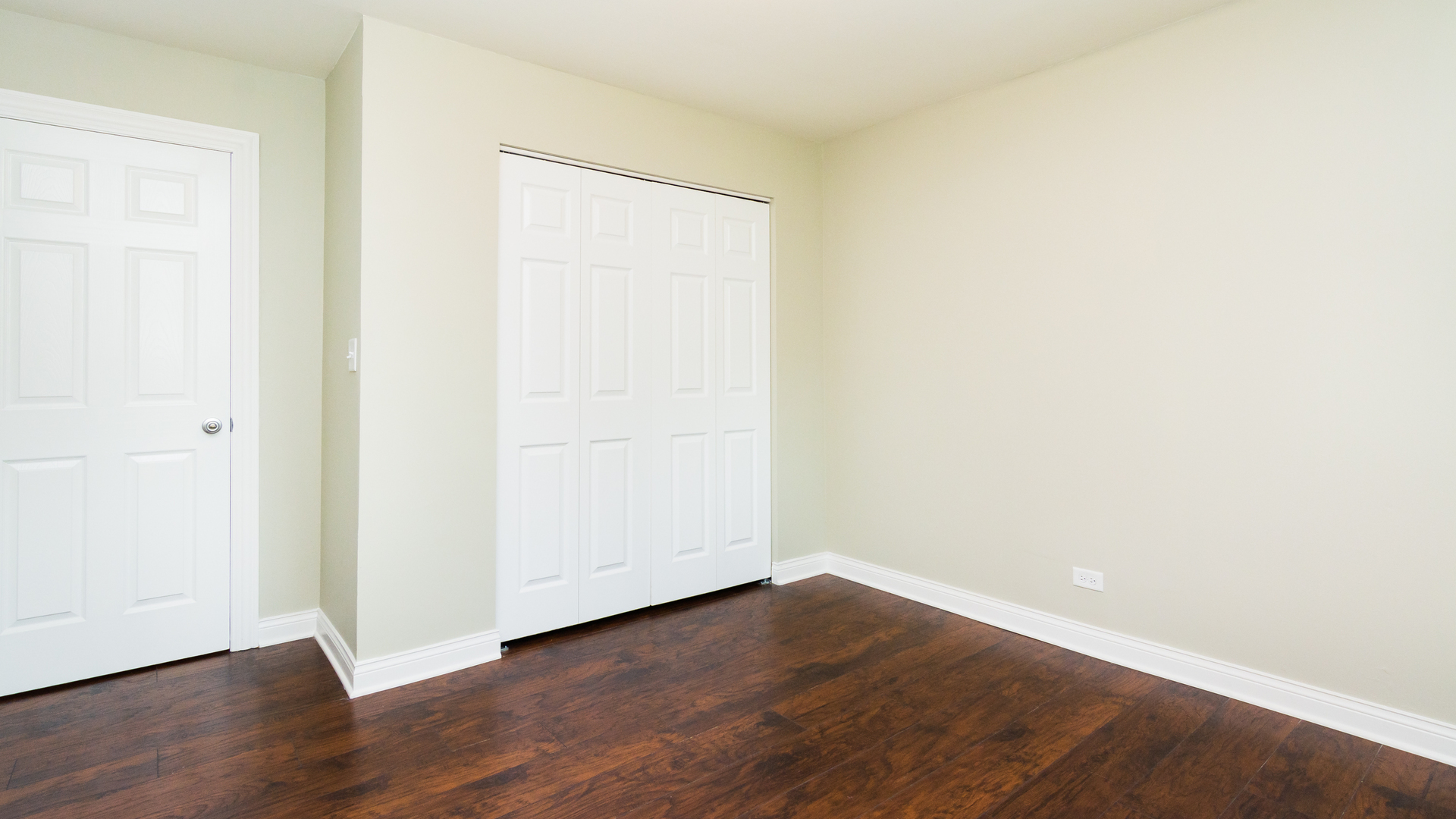 187 Queenswood Road Bolingbrook, IL 60440 - Photo 29 of 36 a view of an empty room with wooden floor