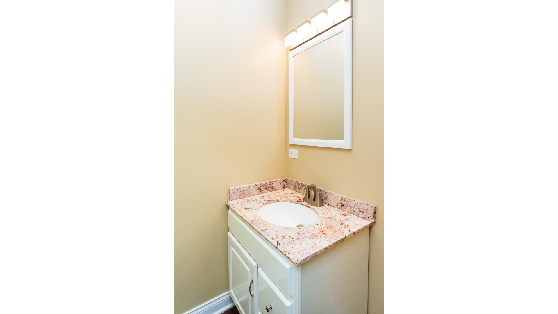 187 Queenswood Road Bolingbrook, IL 60440 - Photo 30 of 36 a utility room with a sink and a mirror