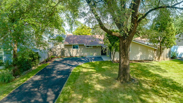 187 Queenswood Road Bolingbrook, IL 60440 - Photo 35 of 36 a view of a yard in front of house
