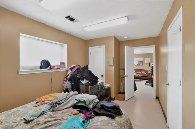 a kitchen with a refrigerator and a sink