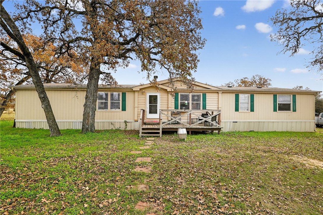 8601 Sandy Point Road Bryan, TX 77807 - Photo 23 of 50 a house view with a garden space