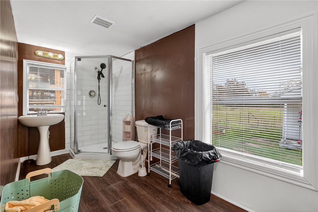 8601 Sandy Point Road Bryan, TX 77807 - Photo 41 of 50 a living room with furniture and a window