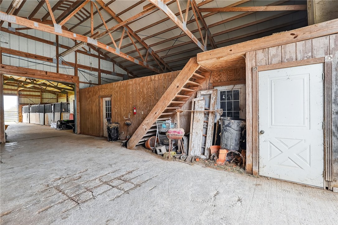 8601 Sandy Point Road Bryan, TX 77807 - Photo 9 of 50 a view of a hallway with wooden walls