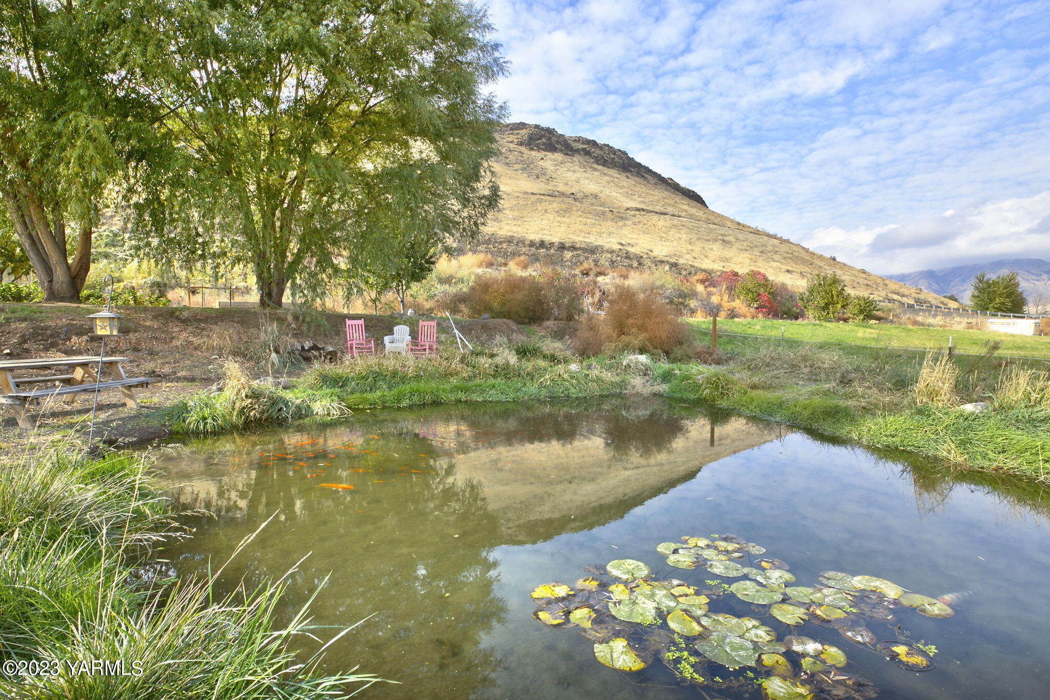 200 Ranger Road Naches, WA 98937 - Photo 15 of 23 a view of a lake with a yard