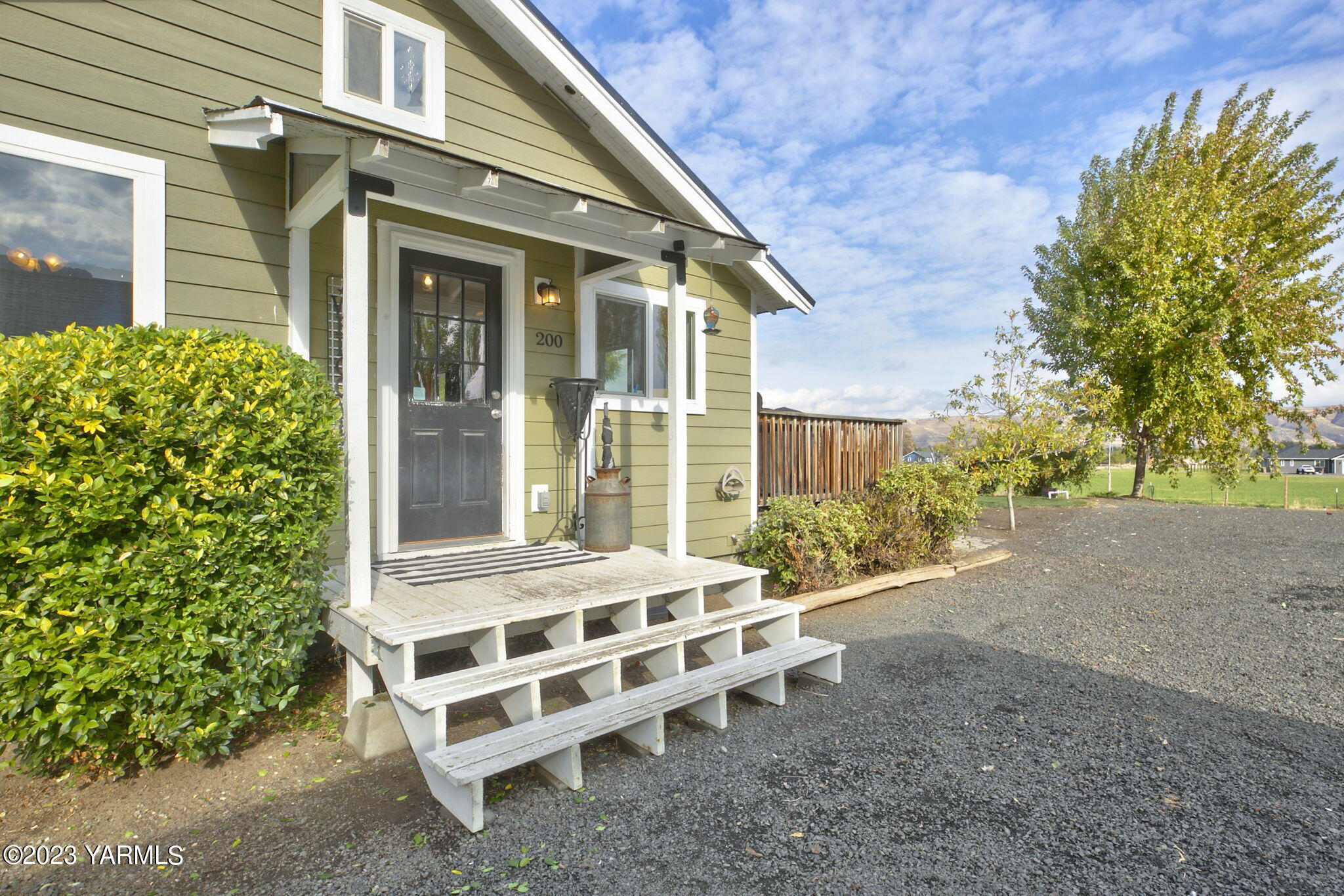 200 Ranger Road Naches, WA 98937 - Photo 4 of 23 a wooden bench sitting in front of a building