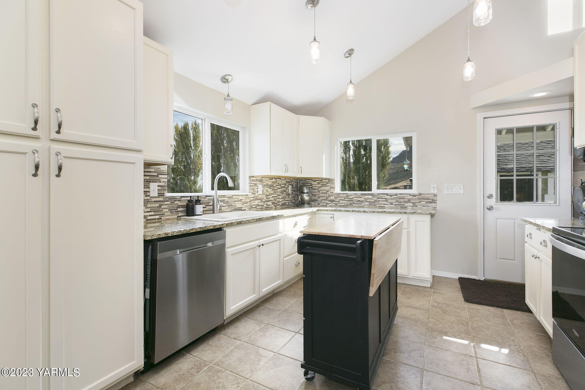 200 Ranger Road Naches, WA 98937 - Photo 8 of 23 a kitchen with a sink cabinets and window