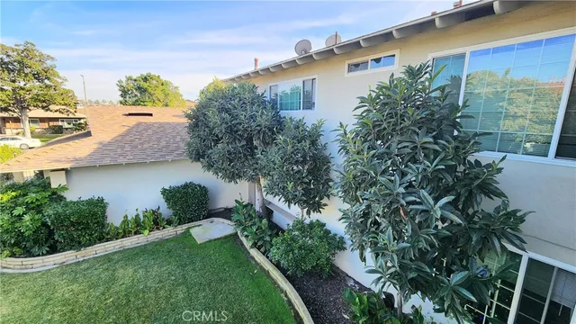 a house with trees in front of it