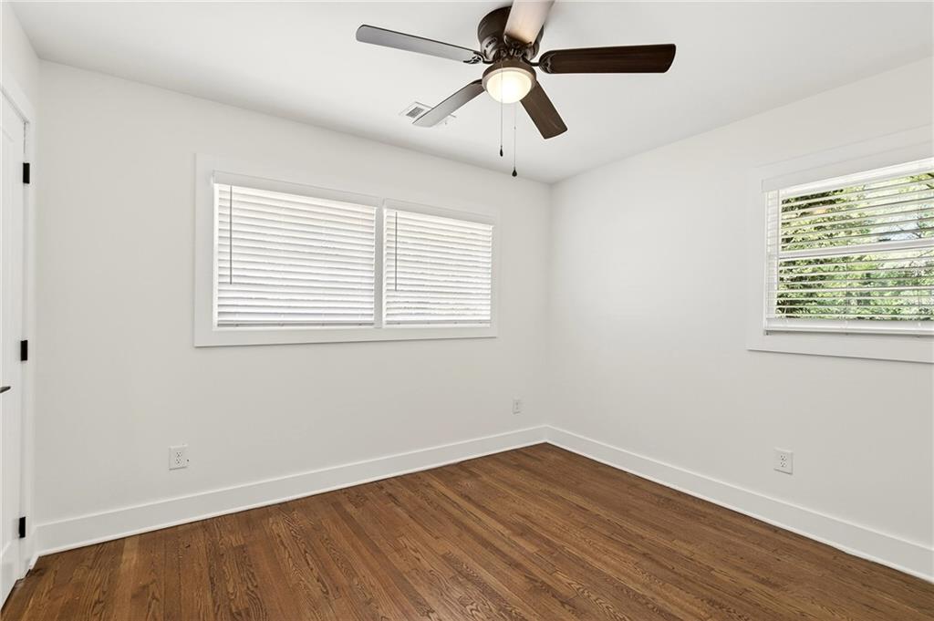 1344 Midlawn Drive Decatur, GA 30032 - Photo 57 of 87 a view of a room with wooden floor and windows