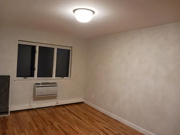 a view of kitchen with wooden floor