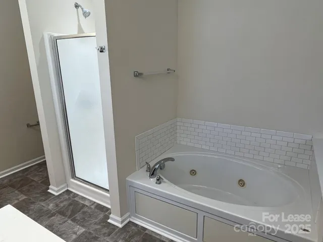 a bathroom with a bathtub