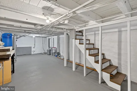 a view of a room with wooden walls