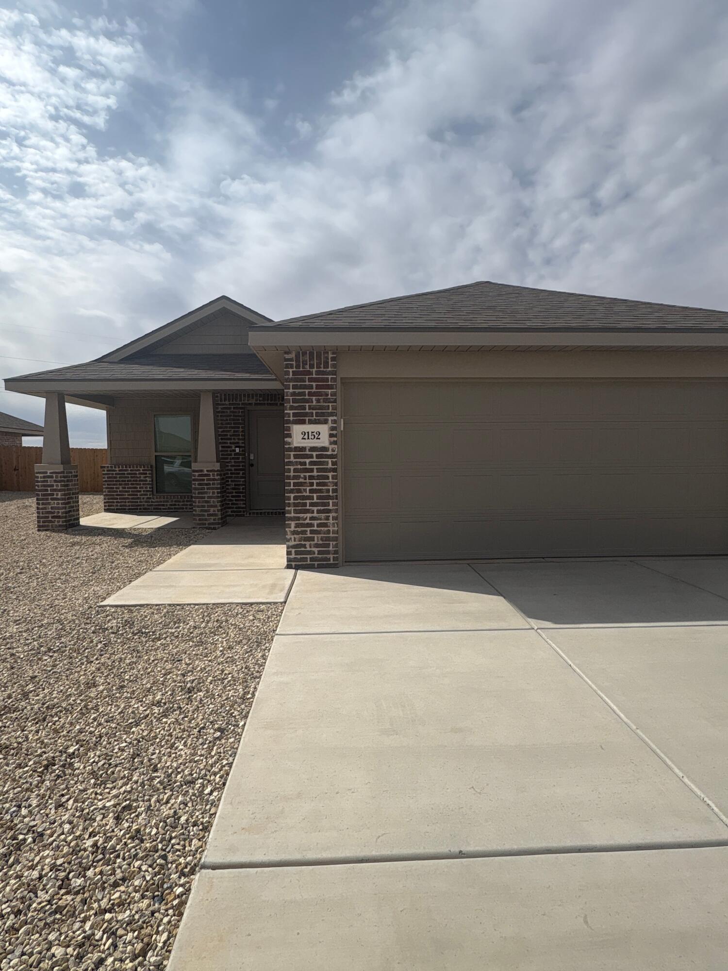 2137 Langford Avenue Lubbock, TX 79407 - Photo 1 of 12 a front view of a house