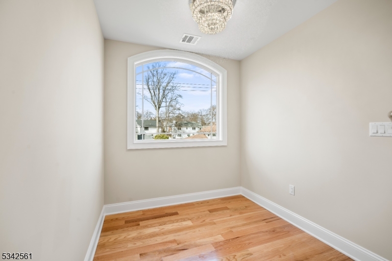 118 Cambridge Road Westfield, NJ 07090 - Photo 28 of 50 an empty room with a window