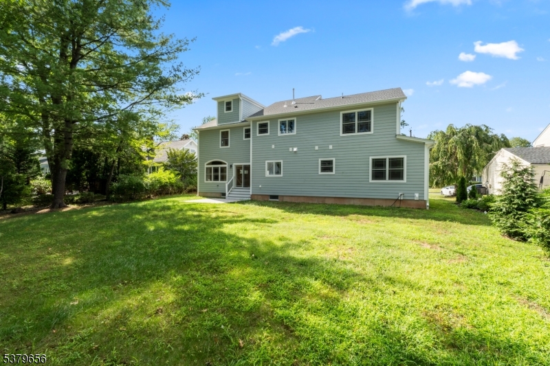 118 Cambridge Road Westfield, NJ 07090 - Photo 4 of 50 a front view of house with yard and trees