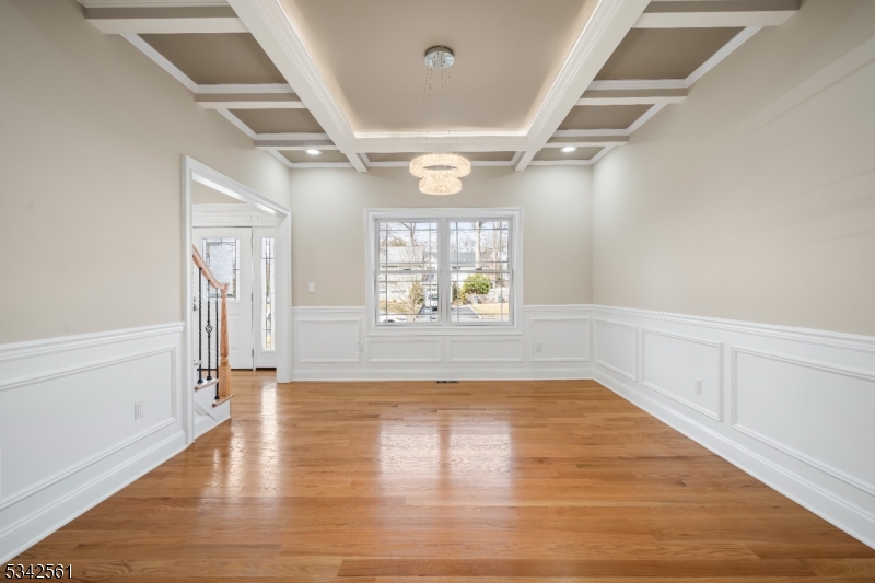 118 Cambridge Road Westfield, NJ 07090 - Photo 10 of 50 wooden floor in an empty room with a window