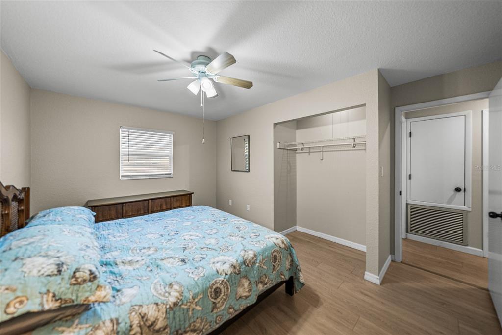 104 North Lake Reedy Boulevard Frostproof, FL 33843 - Photo 19 of 50 a bedroom with a large bed and a window