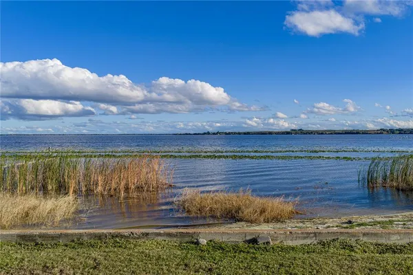 a view of a backyard of a house