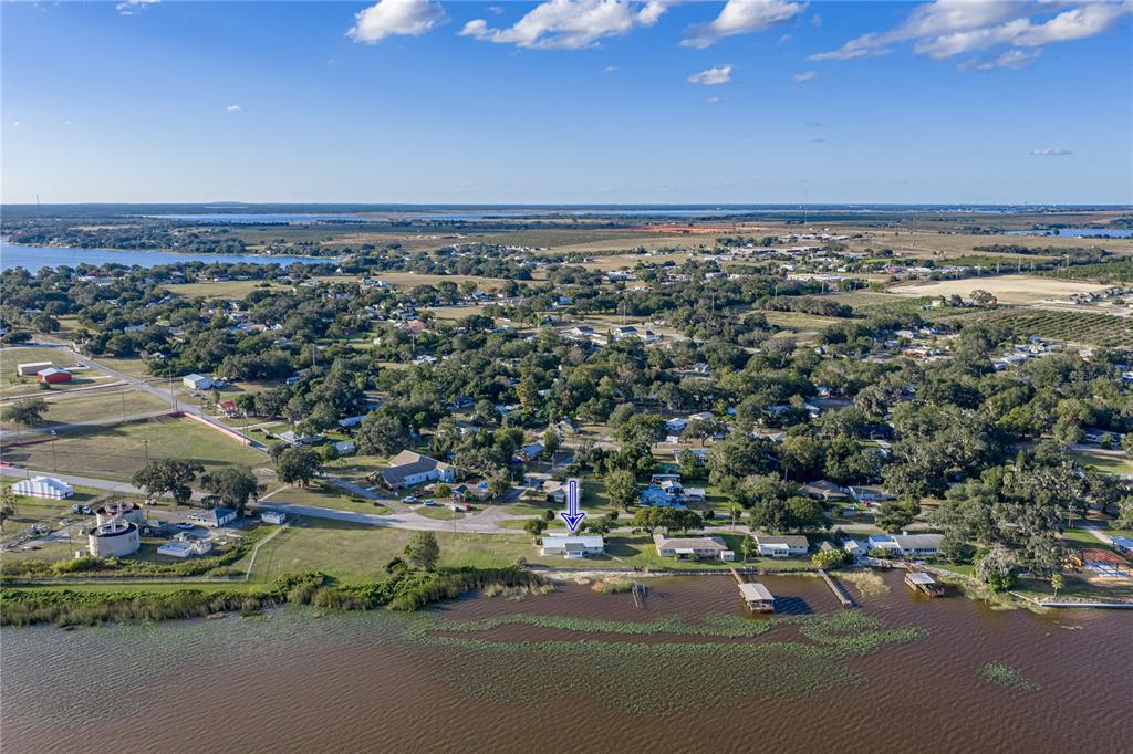 104 North Lake Reedy Boulevard Frostproof, FL 33843 - Photo 39 of 50 an aerial view of a city with lots of residential buildings