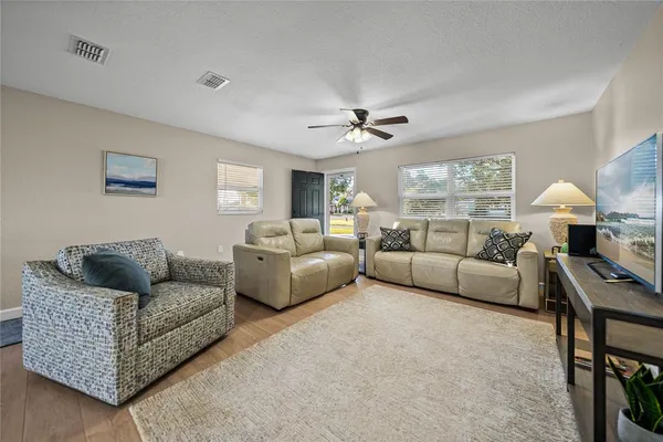 a living room with furniture and a couch