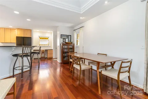a view of a livingroom with furniture and wooden floor