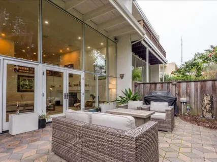 a building outdoor space with patio furniture