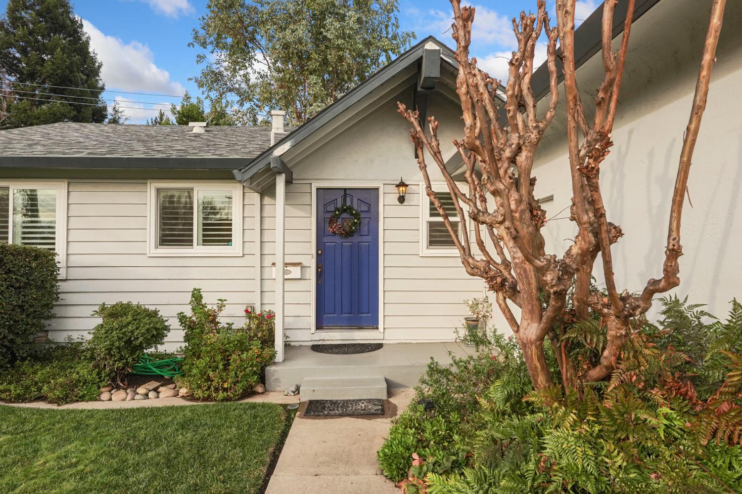 1007 Cardinal Street Lodi, CA 95240 - Photo 2 of 31 a front view of a house with a yard