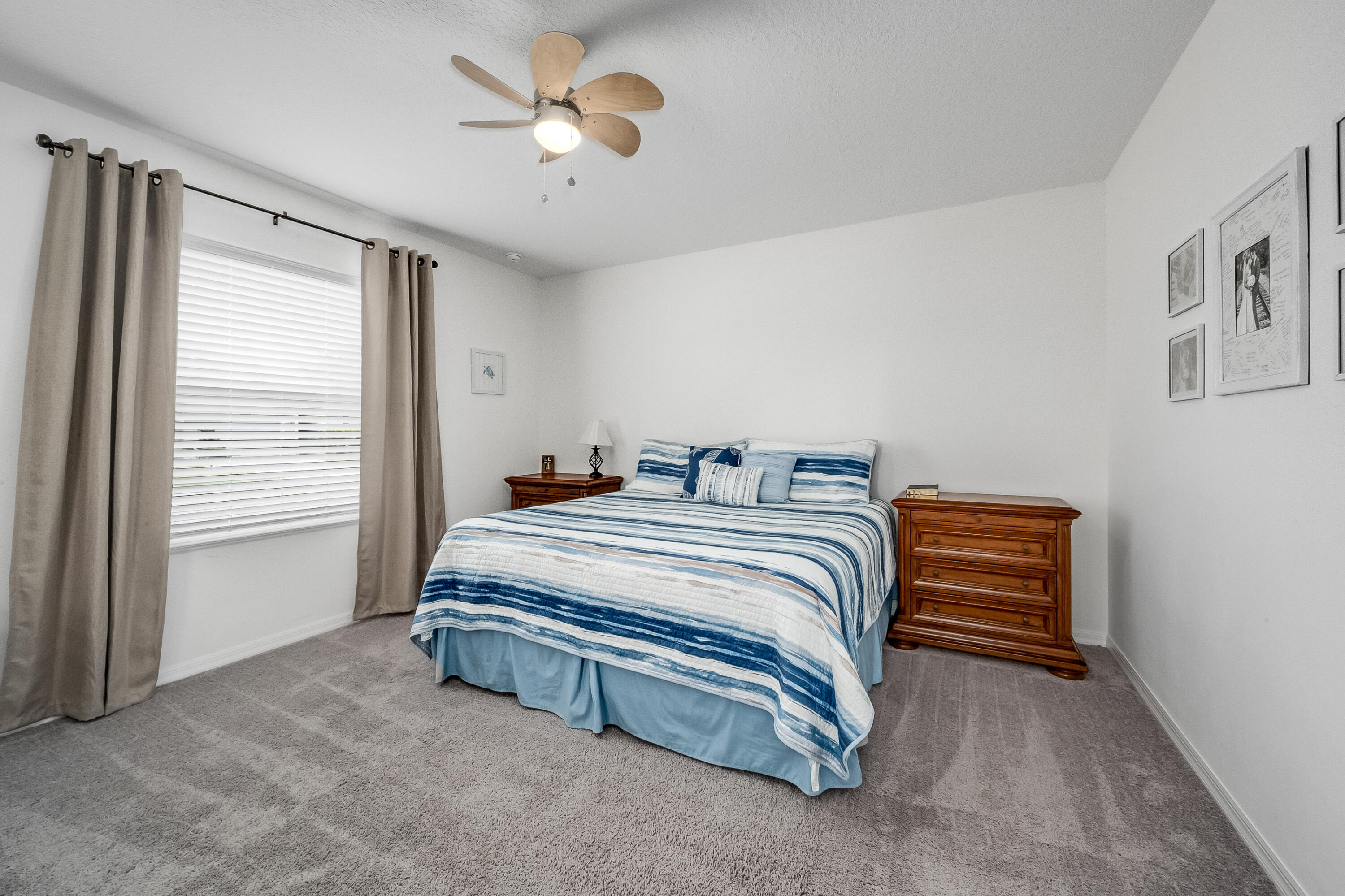 953 Edensor Lane Rockledge, FL 32955 - Photo 15 of 39 a bedroom with bed and a chandelier