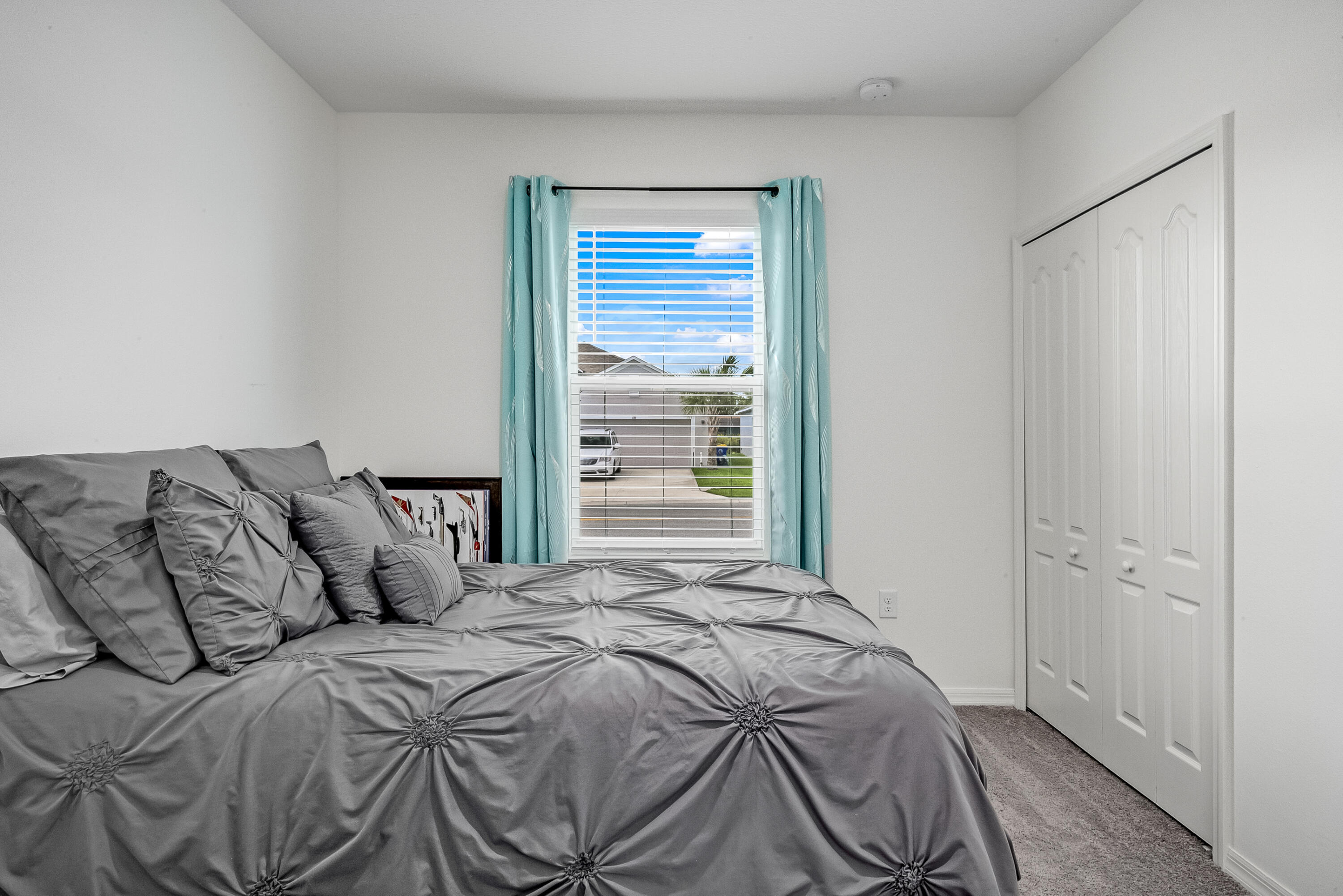 953 Edensor Lane Rockledge, FL 32955 - Photo 25 of 39 a bedroom with a bed and a window