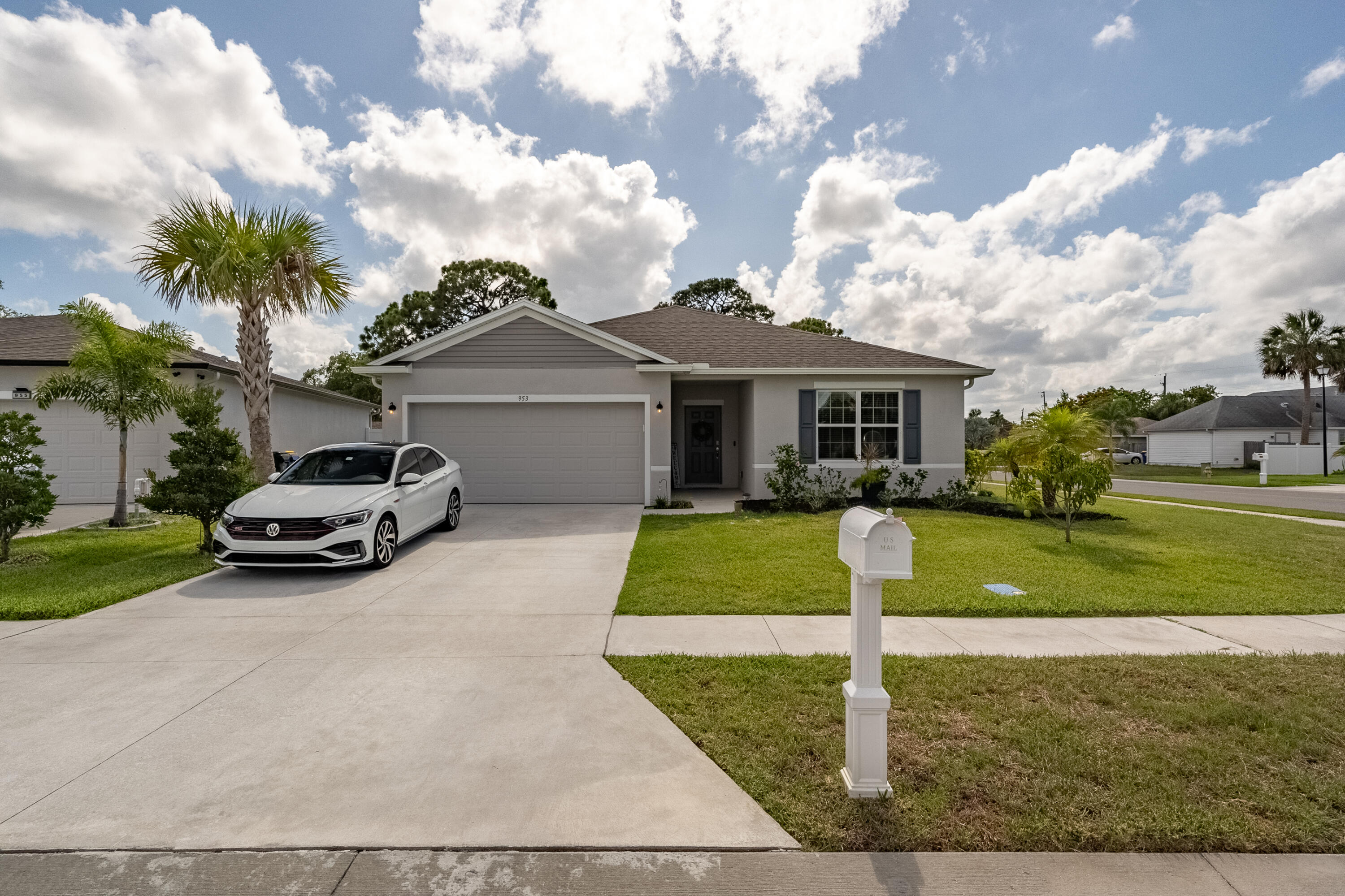 953 Edensor Lane Rockledge, FL 32955 - Photo 28 of 39 a front view of a house with a yard