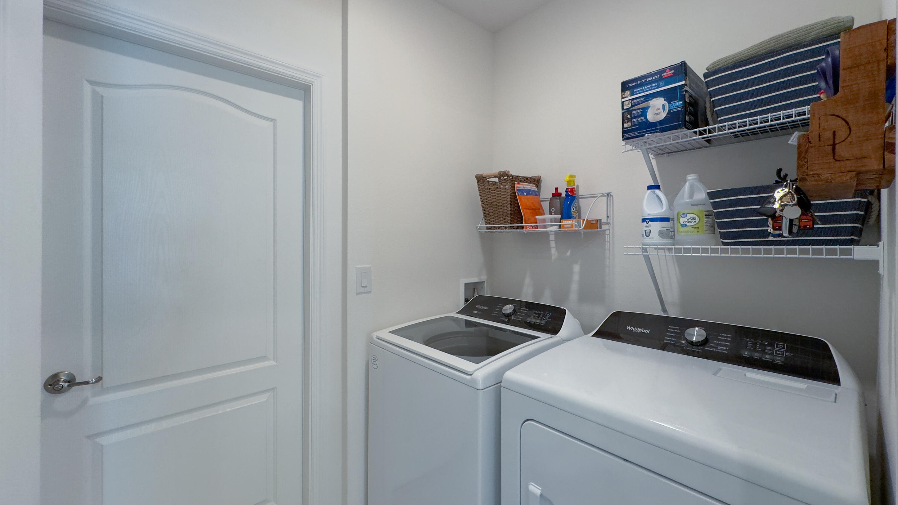 953 Edensor Lane Rockledge, FL 32955 - Photo 29 of 39 a view of storage and utility room with washer and dryer