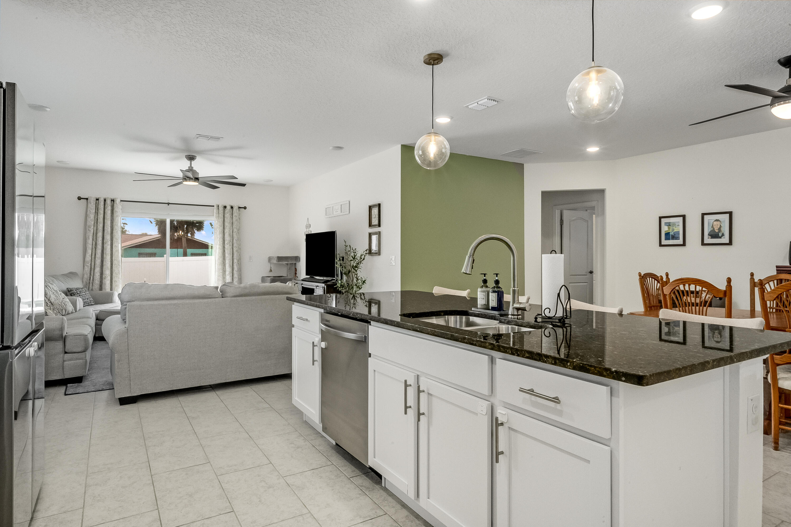 953 Edensor Lane Rockledge, FL 32955 - Photo 7 of 39 a kitchen with lots of counter space and window