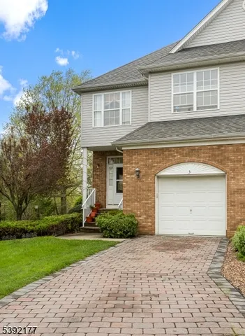 a front view of house with yard