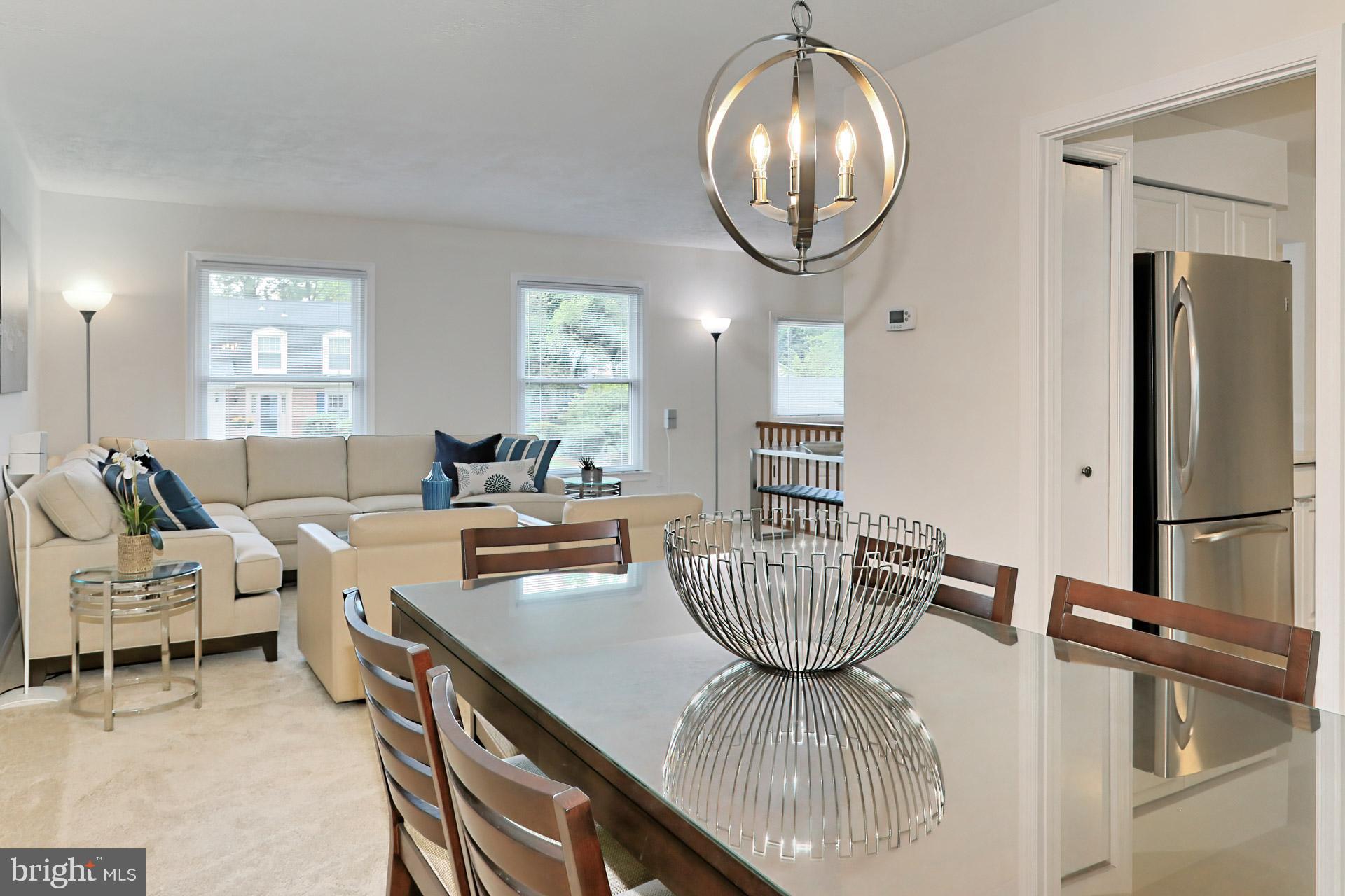 9110 Rockefeller Lane Springfield, VA 22153 - Photo 12 of 56 Dining room with new fusion orb light fixture