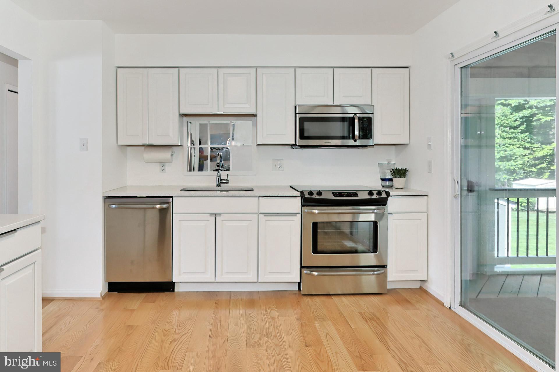 9110 Rockefeller Lane Springfield, VA 22153 - Photo 14 of 56 Quartz counters and stainless appliances