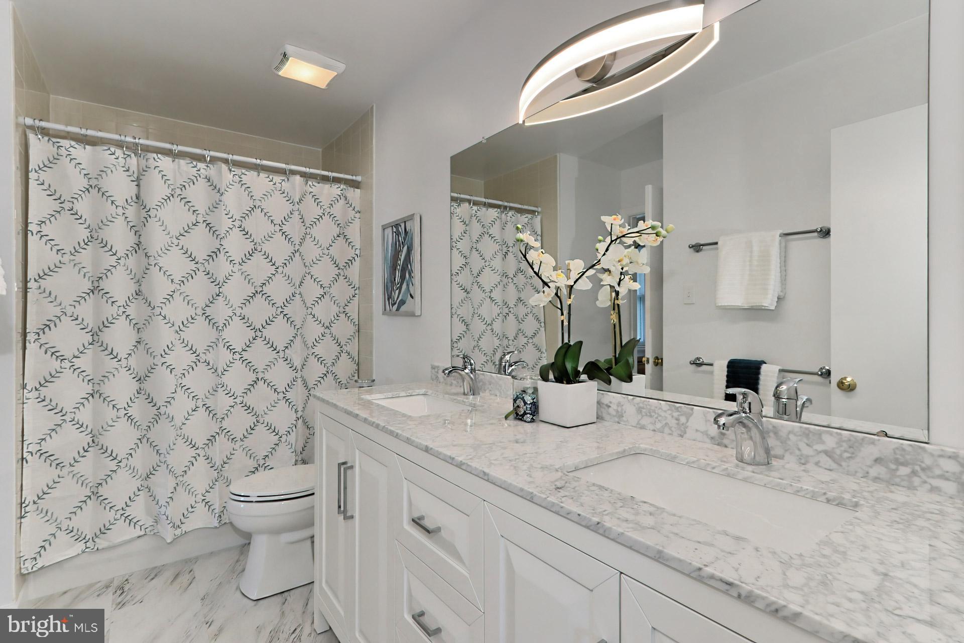 9110 Rockefeller Lane Springfield, VA 22153 - Photo 25 of 56 Gorgeous dual entry upper bathroom