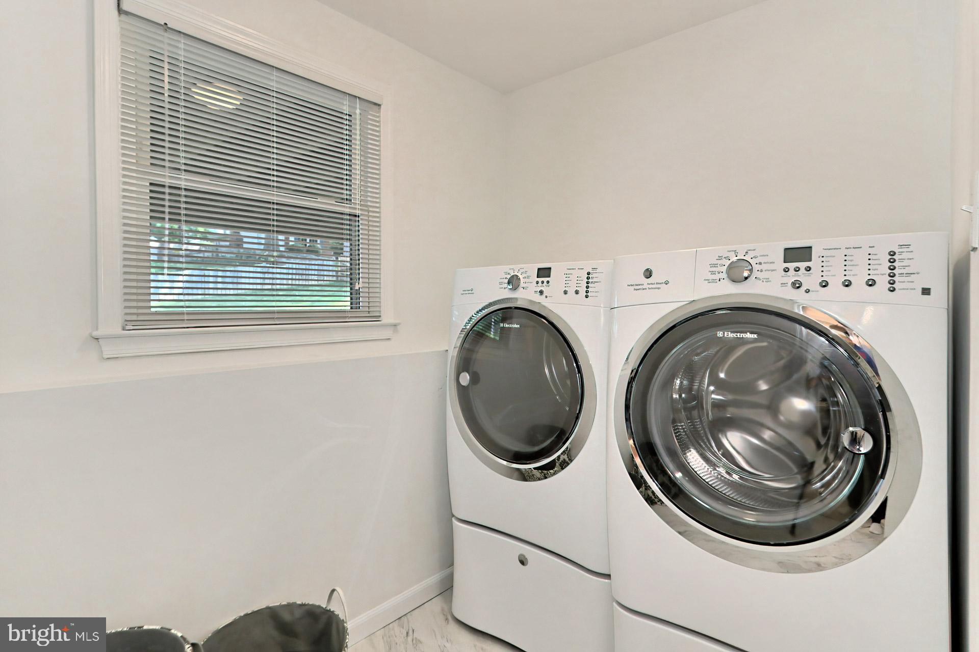 9110 Rockefeller Lane Springfield, VA 22153 - Photo 35 of 56 Bright laundry room