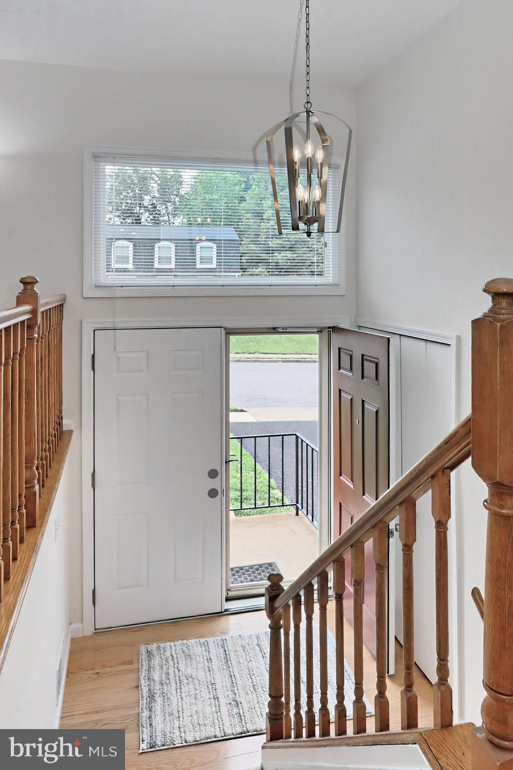 9110 Rockefeller Lane Springfield, VA 22153 - Photo 6 of 56 Welcoming Foyer with new chandelier