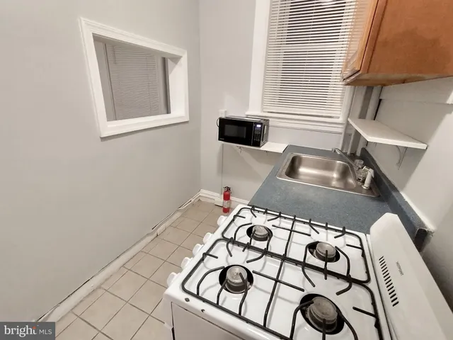 a view of a living room and a window