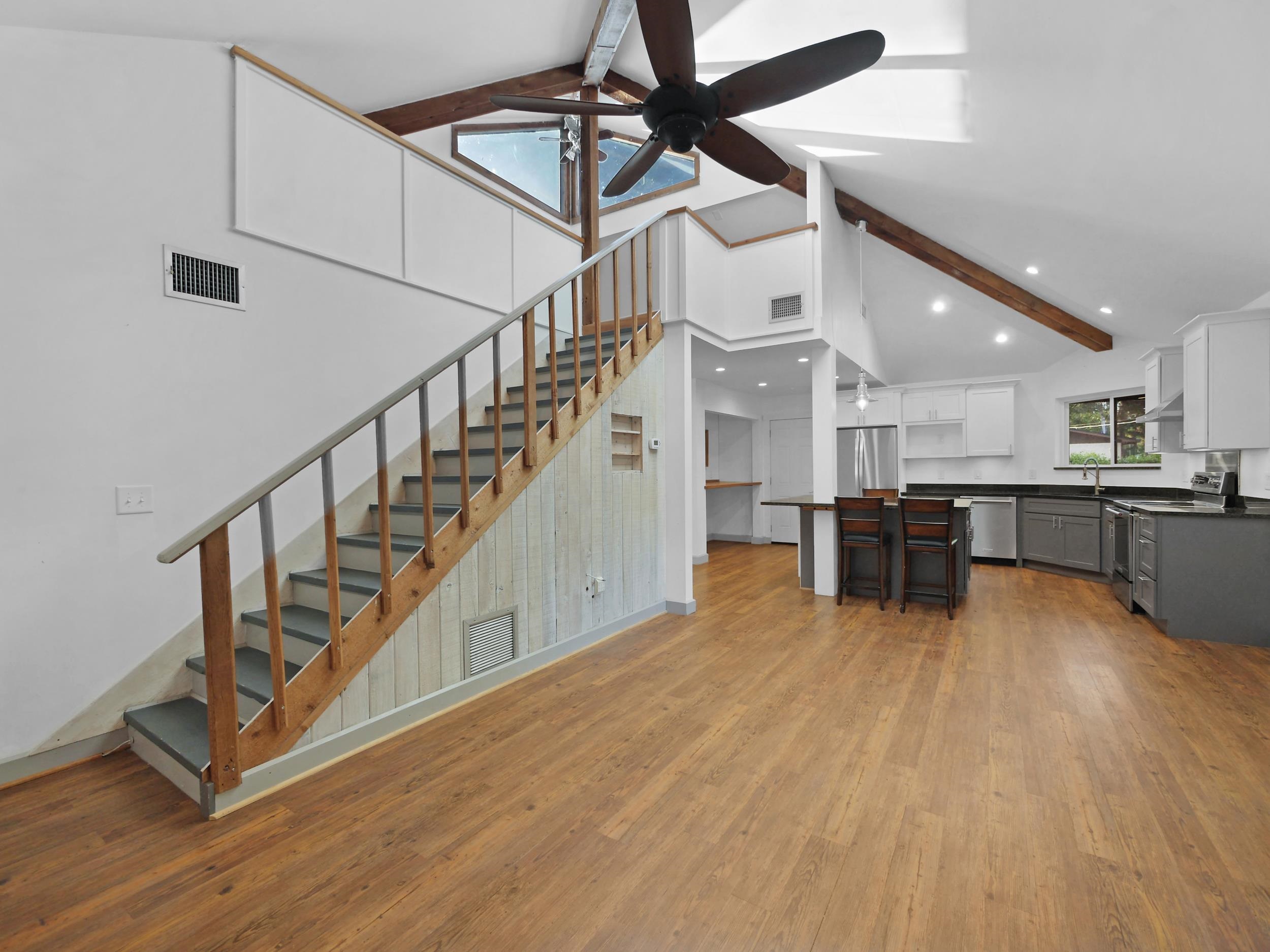 369 Orchis Road St. Augustine, FL 32086 - Photo 11 of 41 a view of kitchen and hall with wooden floor