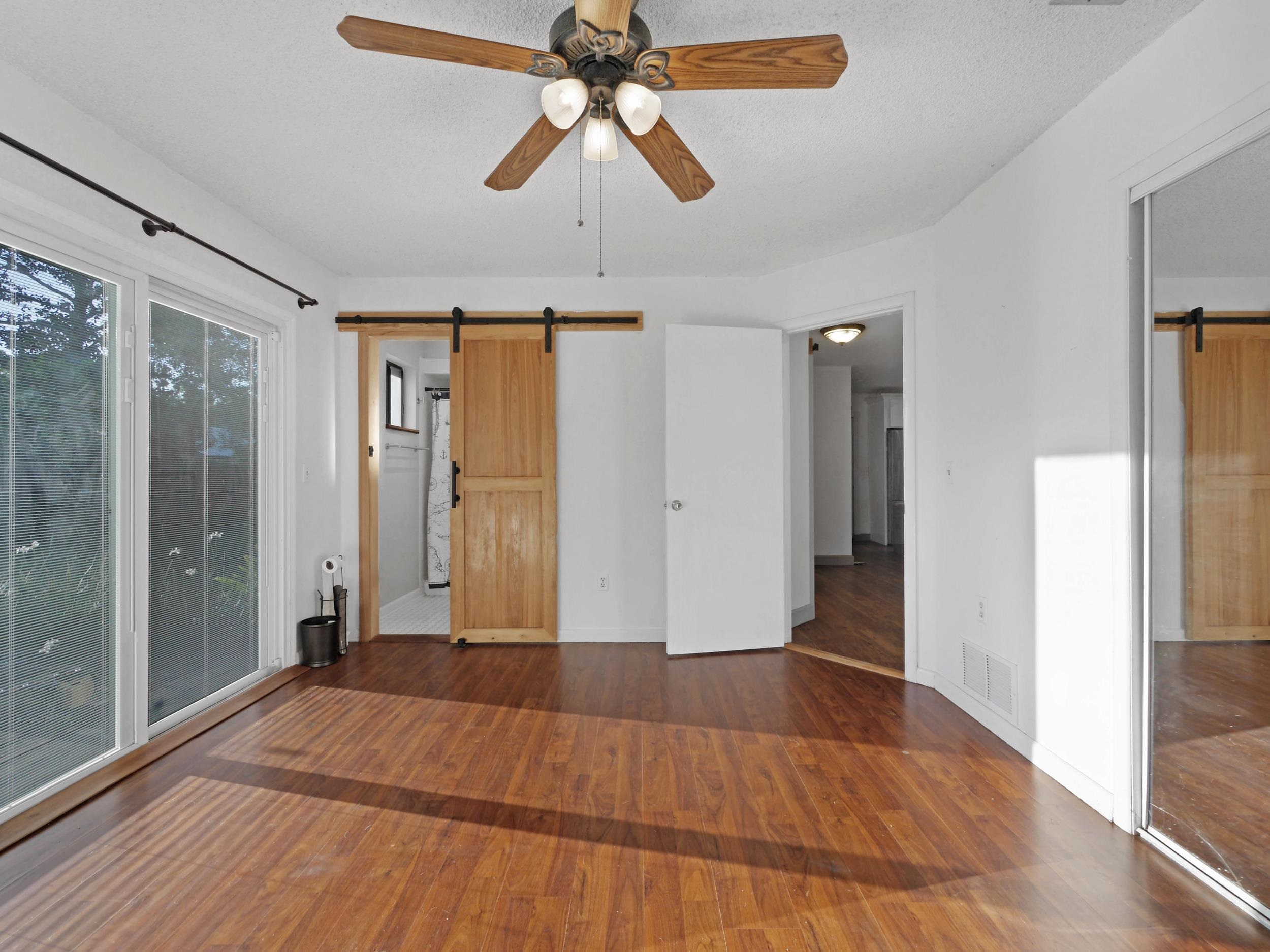 369 Orchis Road St. Augustine, FL 32086 - Photo 20 of 41 a view of empty room with wooden floor