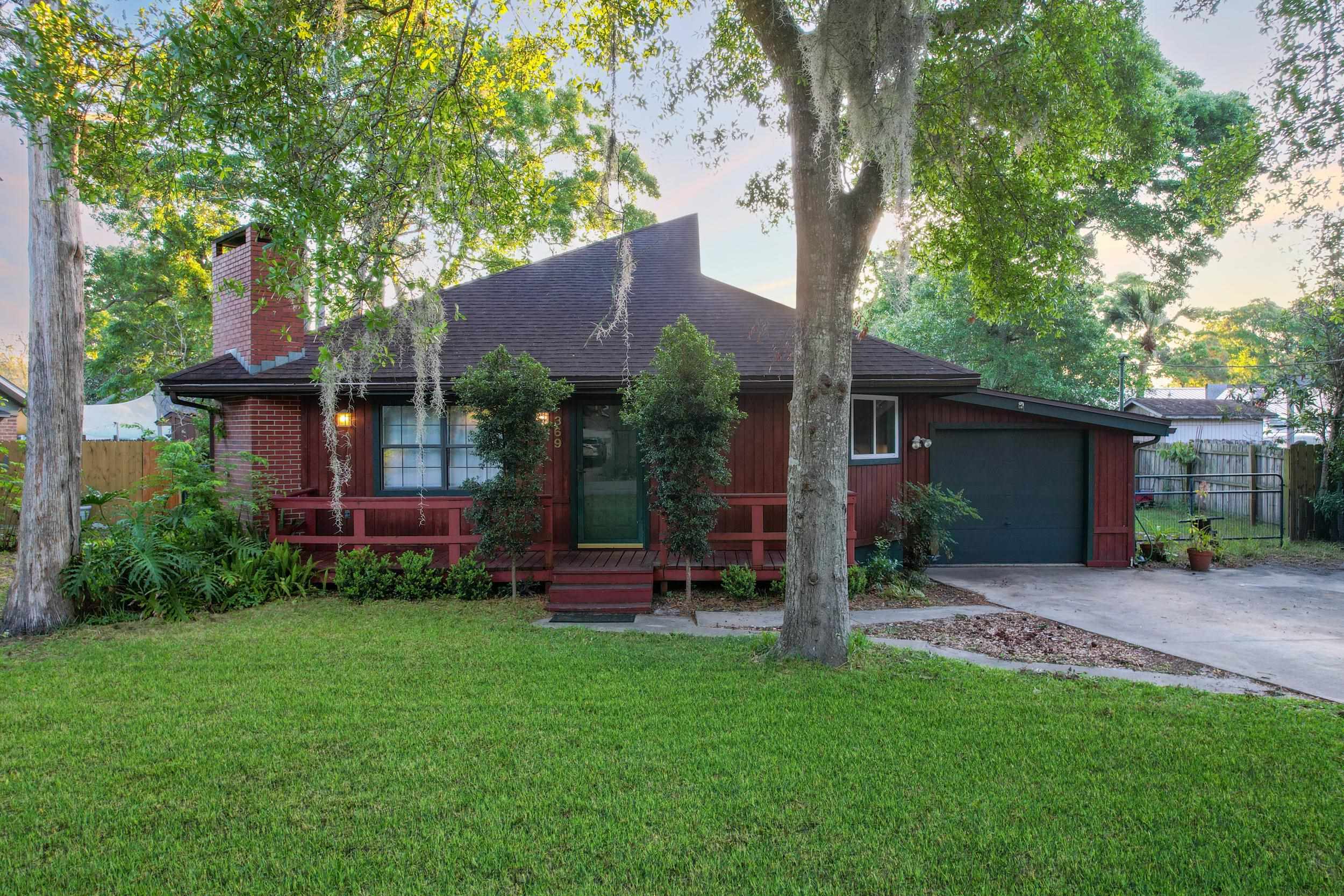 369 Orchis Road St. Augustine, FL 32086 - Photo 2 of 41 front view of a house with a yard