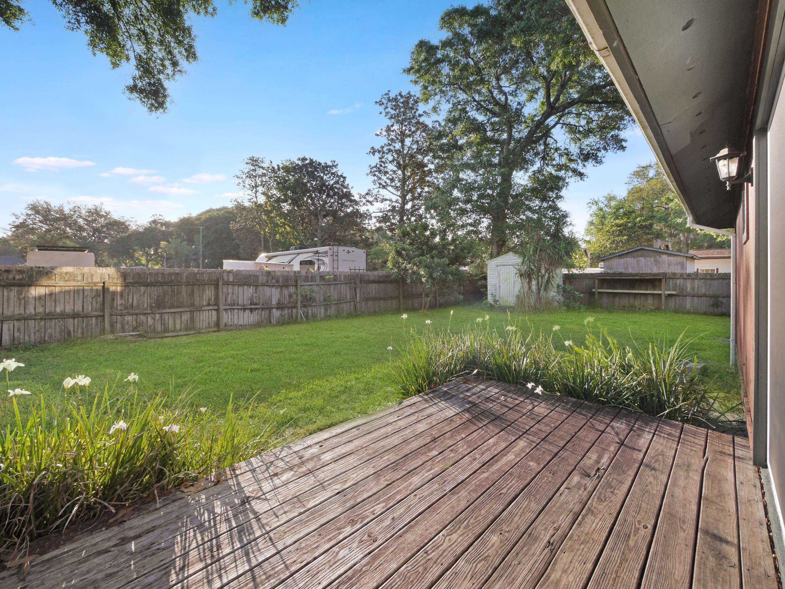 369 Orchis Road St. Augustine, FL 32086 - Photo 26 of 41 a view of a backyard with a garden