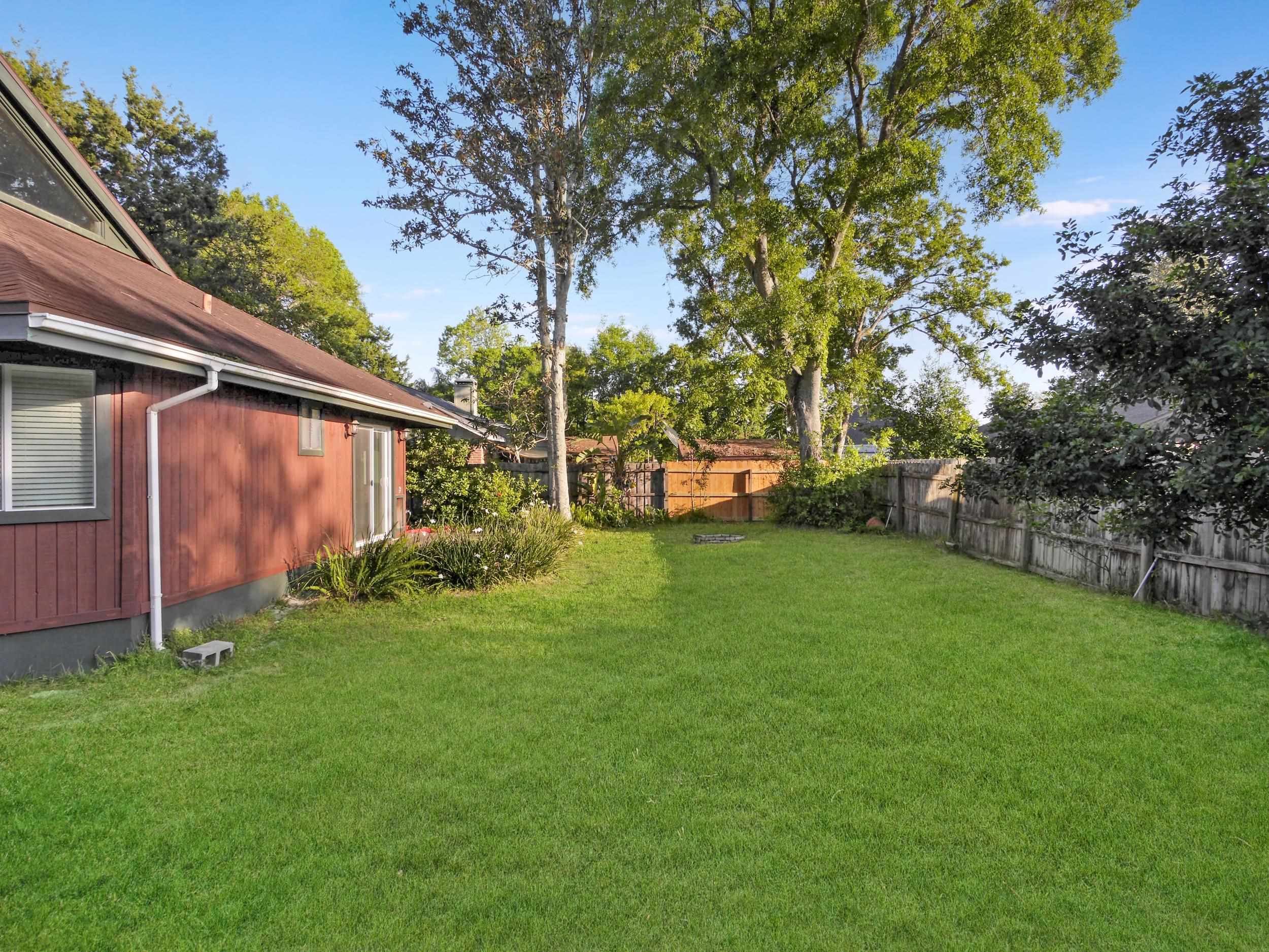 369 Orchis Road St. Augustine, FL 32086 - Photo 28 of 41 a view of a backyard with a garden