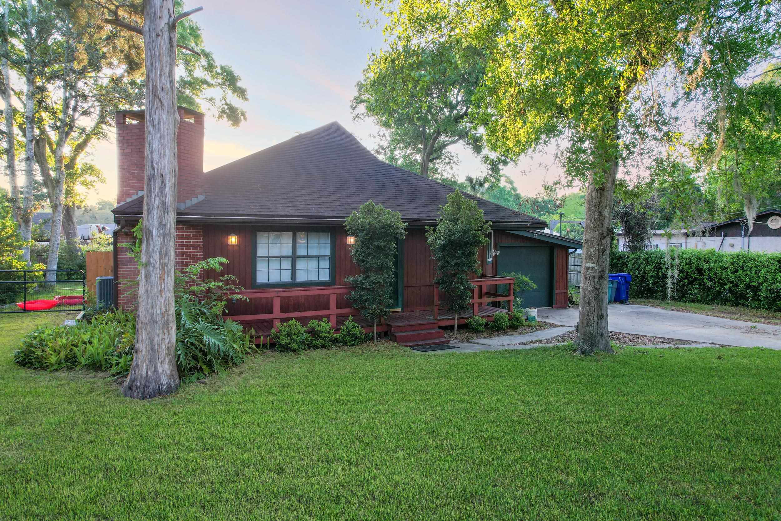 369 Orchis Road St. Augustine, FL 32086 - Photo 36 of 41 a view of a house with a yard and sitting area