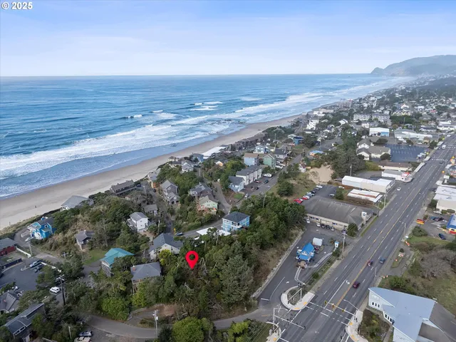 an aerial view of beach and ocean